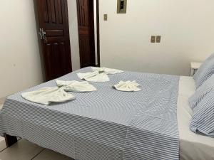 Postel nebo postele na pokoji v ubytování Pousada Recanto do Norte