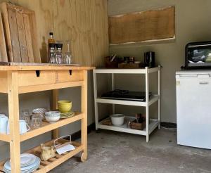 Kuchyň nebo kuchyňský kout v ubytování Cozy Garden Glamping