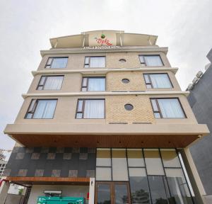 a tall building with a sign on top of it at The Byke Stella Boutique Hotel Pan India Pure Veg Hotel Chain in Indore
