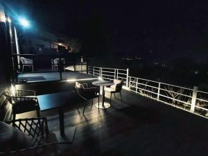 小景 绿 擁有私人露天溫泉 與由布岳四季對望 免費接送 免費停車的阳台或露台