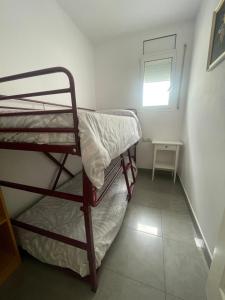 Posteľ alebo postele v izbe v ubytovaní Platja del Port