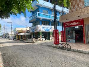 a bike parked on the side of a street at Apartamento Baixu 2 in Prado