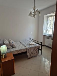 Ένα ή περισσότερα κρεβάτια σε δωμάτιο στο Da Gio' e Eli