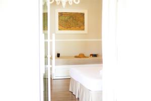 Postel nebo postele na pokoji v ubytování B&B Le Bianche