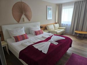 Postel nebo postele na pokoji v ubytování Maxhotel + 37 fotografií