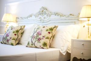 Postel nebo postele na pokoji v ubytování B&B Le Bianche