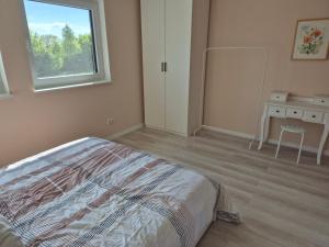 Ένα ή περισσότερα κρεβάτια σε δωμάτιο στο Homburgs Schöne Aussicht