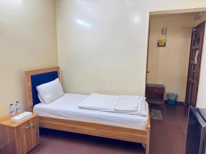 Postel nebo postele na pokoji v ubytování Al Khaima Hotel