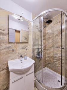 Kúpeľňa v ubytovaní Guesthouse Korzo + 37 fotografií