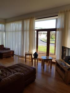 Posezení v ubytování Woodlands Lodges Mulranny