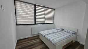 Postel nebo postele na pokoji v ubytování Nordic Residence 5