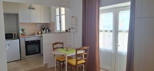 Η κουζίνα ή μικρή κουζίνα στο Bella vista