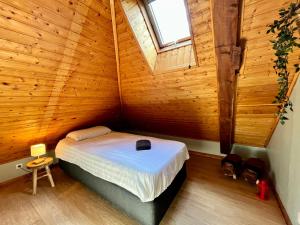 Postel nebo postele na pokoji v ubytování La Cascade, Venosc - Les 2 Alpes