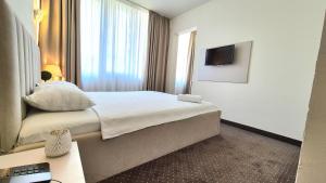 Krevet ili kreveti u jedinici u okviru objekta Hotel Marie