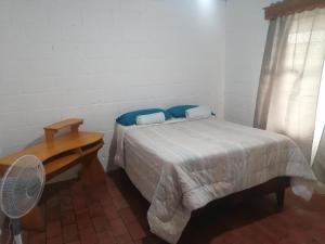 Postel nebo postele na pokoji v ubytování Coco Beach House