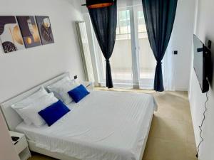 Ένα ή περισσότερα κρεβάτια σε δωμάτιο στο Oxana Summer Alezzi +32 φωτογραφίες