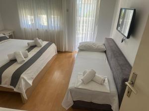 Afbeelding uit fotogalerij van Apartmani Mira in Vodice