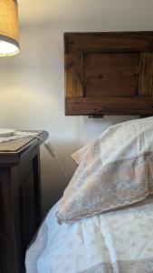 Postel nebo postele na pokoji v ubytování B&B Ginestra