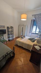 Postel nebo postele na pokoji v ubytování B&B Ginestra