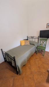 Postel nebo postele na pokoji v ubytování B&B Ginestra