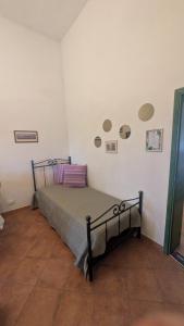 Postel nebo postele na pokoji v ubytování B&B Ginestra