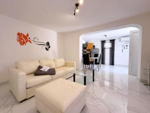 Posteľ alebo postele v izbe v ubytovaní Top Apartments