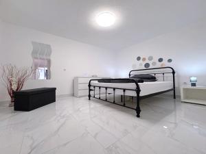 Posteľ alebo postele v izbe v ubytovaní Top Apartments