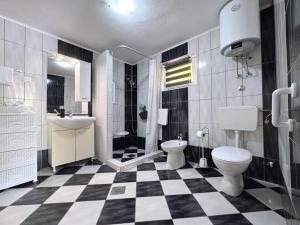 Kúpeľňa v ubytovaní Top Apartments