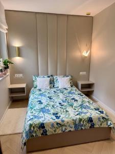 Ένα ή περισσότερα κρεβάτια σε δωμάτιο στο Apartament Kaszmirowy +28 φωτογραφίες