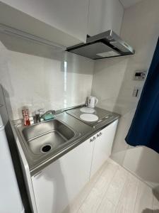 Η κουζίνα ή μικρή κουζίνα στο 新築OPEN GREW OJI residence102