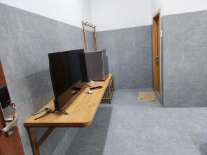 TV a/nebo společenská místnost v ubytování Xóm Giữa homestay