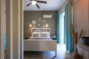 Postel nebo postele na pokoji v ubytování Hotel Kastri