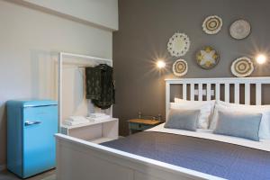 Postel nebo postele na pokoji v ubytování Hotel Kastri