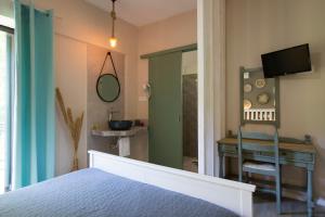 Postel nebo postele na pokoji v ubytování Hotel Kastri