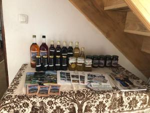 a group of bottles of wine sitting on a table at Kuca in Boljevac