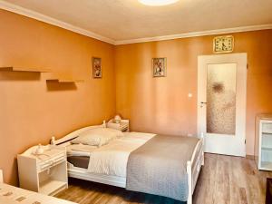 Postel nebo postele na pokoji v ubytování Villa Lux