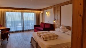 Łóżko lub łóżka w pokoju w obiekcie Hotel Rosslaufhof