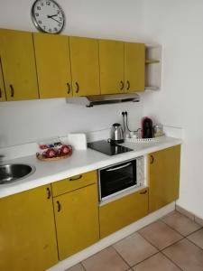 A kitchen or kitchenette at Porta Mazzini Affittacamere