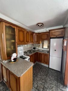 Kuchyň nebo kuchyňský kout v ubytování Apartamento Mari