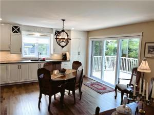 Imagine din galeria proprietății Cozy Stay with Balcony, BBQ & Trails, Near Lake Lyster în Coaticook