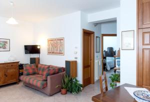 a living room with a couch and a table at Xenia in Castrovillari