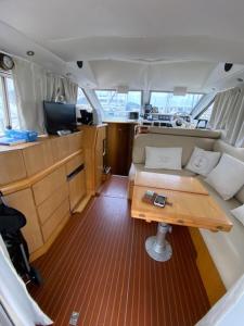 a view of the inside of a boat with a table at une place au soleil in Cannes