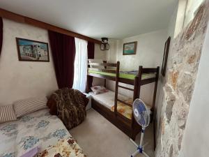Postel nebo postele na pokoji v ubytování Michel Guesthouse