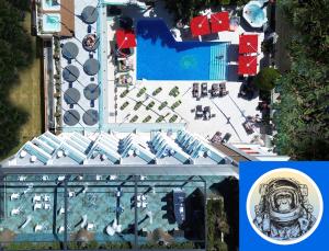 an overhead view of a pool and a building at Essence Hotel Boutique in Torremolinos