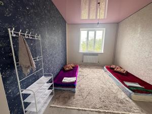 Postel nebo postele na pokoji v ubytování Ulukhaus