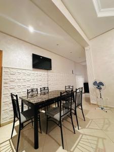 TV a/nebo společenská místnost v ubytování Appartement spacieux + 1 fotografie