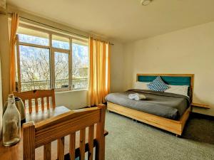 Postel nebo postele na pokoji v ubytování La Heim Hostels