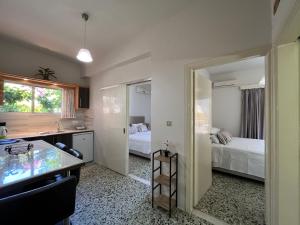 A bed or beds in a room at Nikos Studios