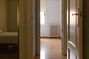 an open door to a bedroom with a bed at Albaceteloft Avenida España in Albacete