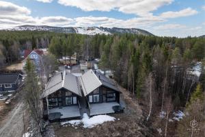 an aerial view of a house in the woods at Villa Cloudberry by Hilla Villas in Kittilä
